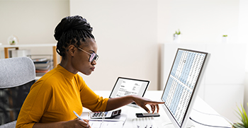 A medical practice director researching and comparing practice management solutions